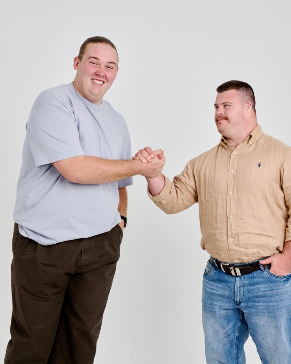 Jett sharing a handshake moment with a Build participant